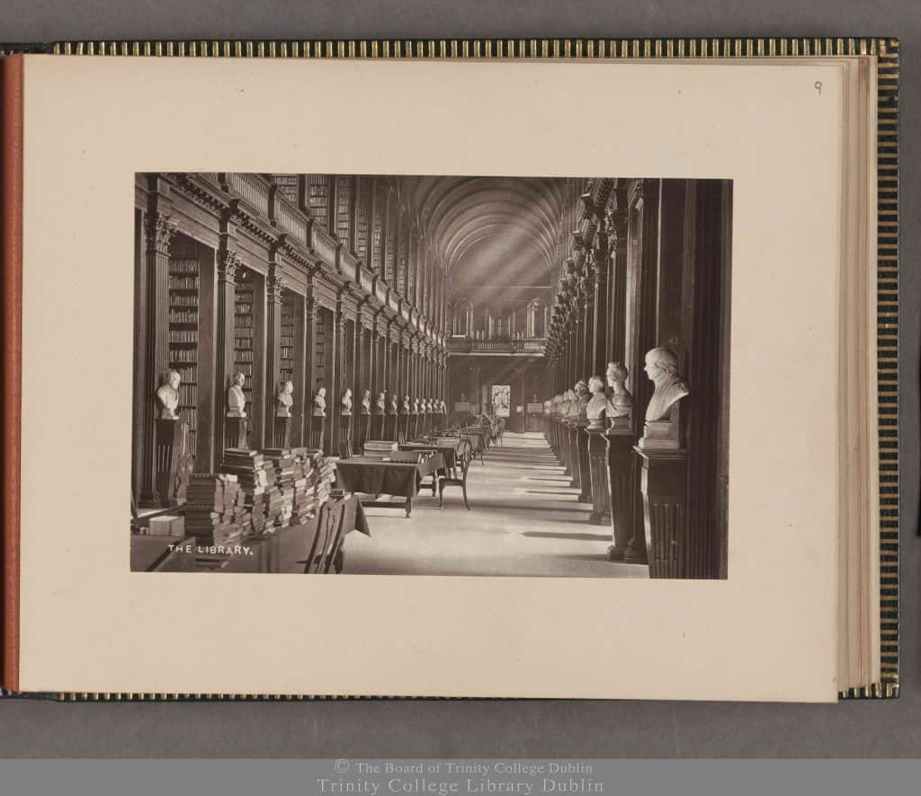 Photograph of the Long Room at Trinity College Dublin. Also shown are marble busts.