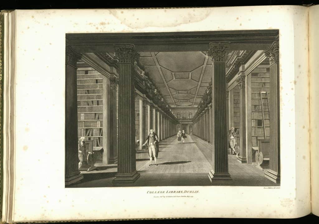 An engraving of the interior of the Long Room. Columns are in the front with the long room behind them. Bookshelves are off on the sides.