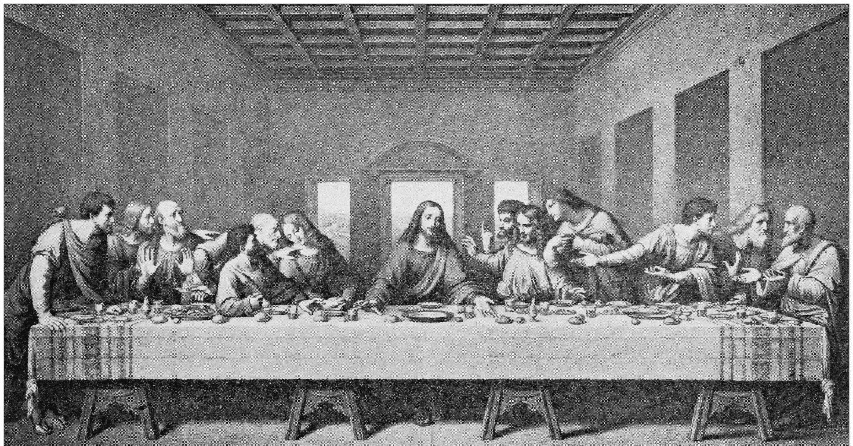 Black and white rendering of Leonardo da Vinci's "The Last Supper". Twelve men are seated at a dinner table, talking. Jesus is in the middle of the table.