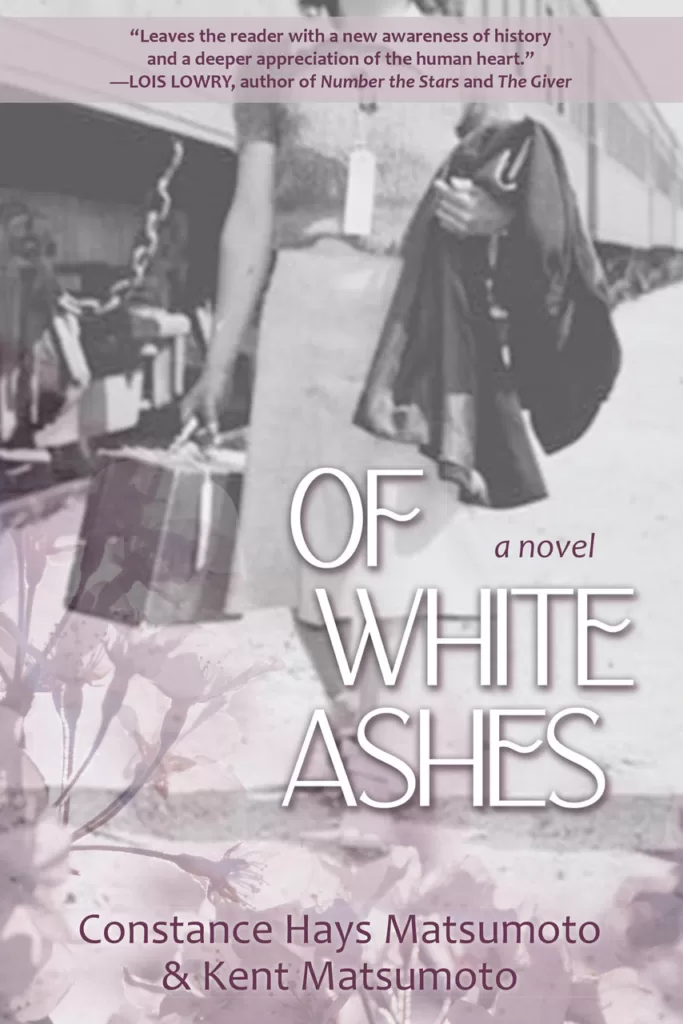 Cover of "Of White Ashes". A young woman walks away from a boat.